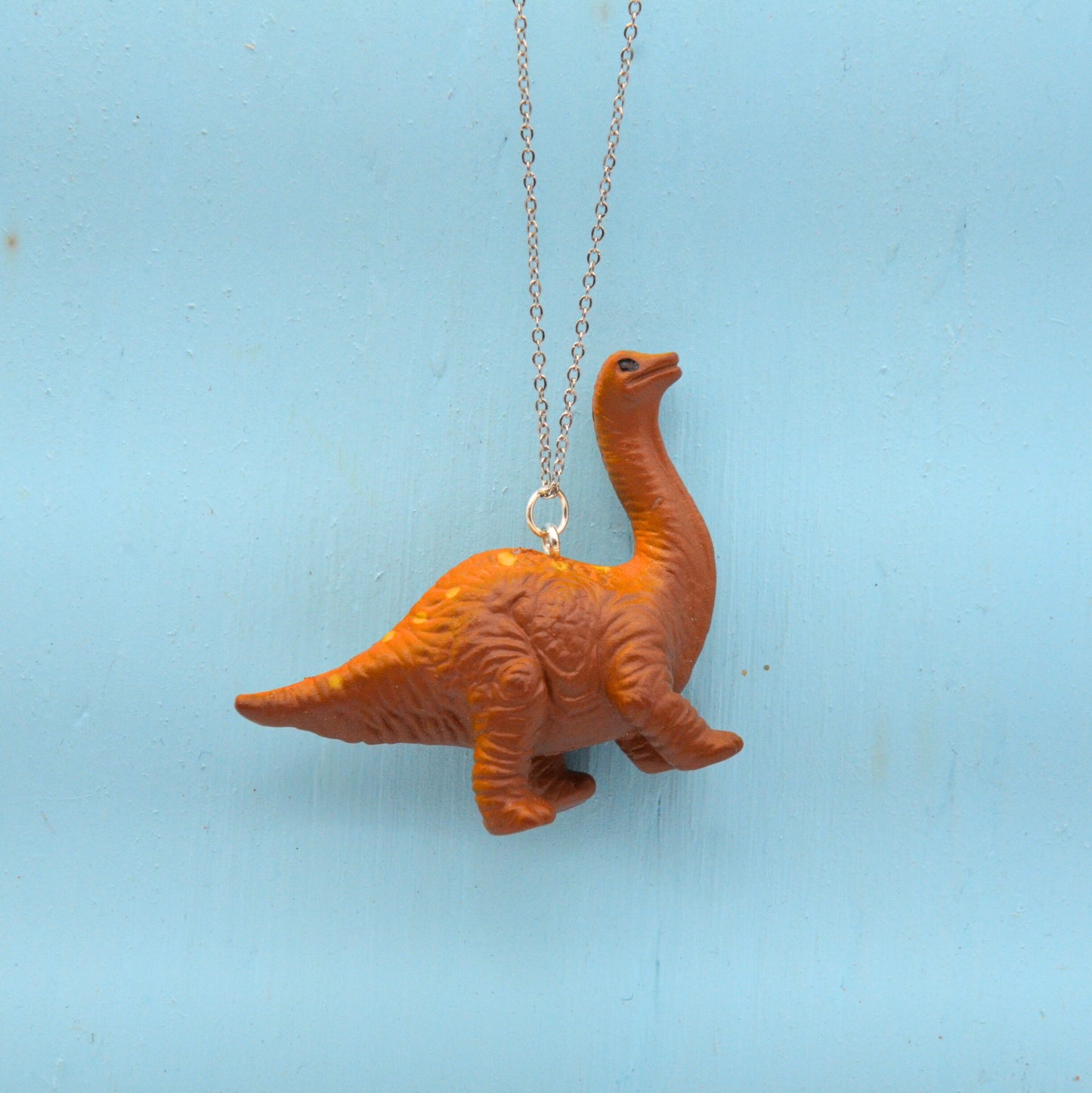 Halsband prickig brun dinosaurie