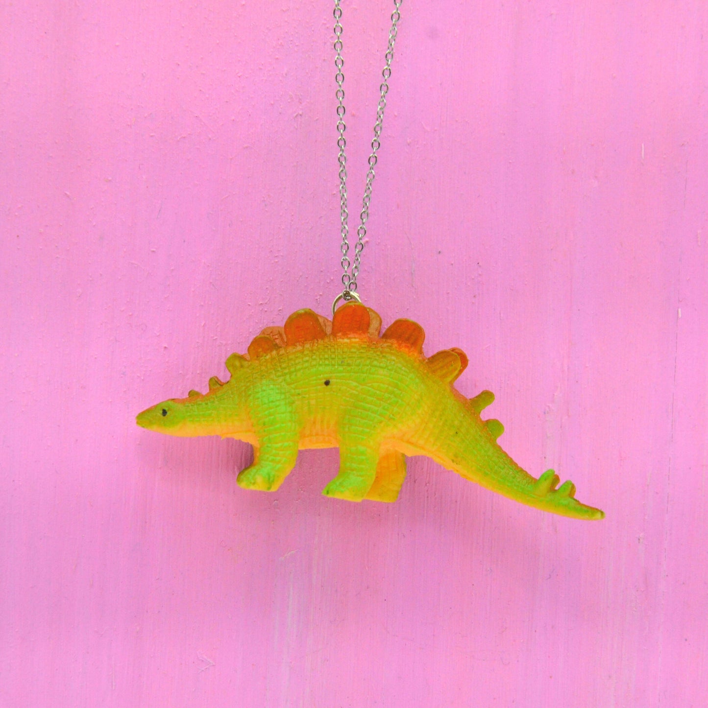 Halsband orangegrön dinosaurie