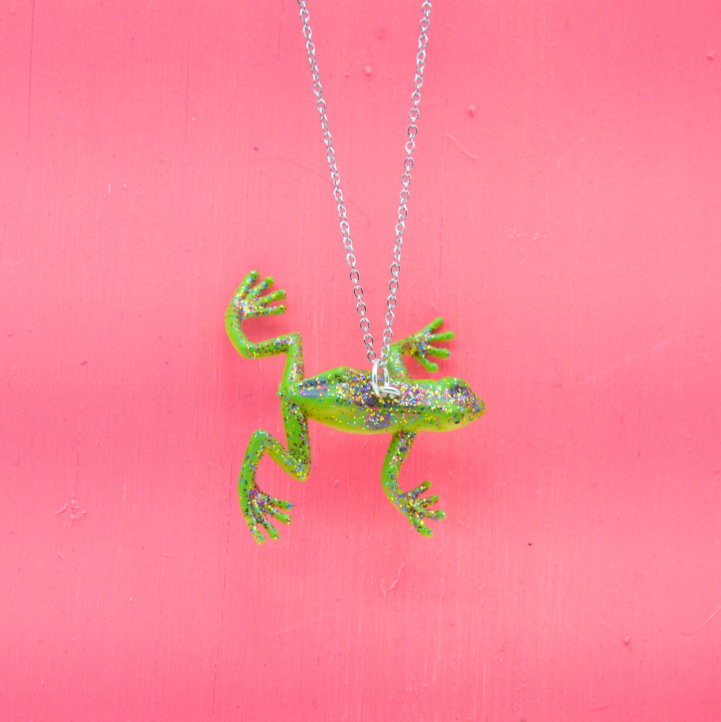 Halsband glittrig groda